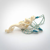 This pendant is a gorgeous and intricately carved mermaid and merman pendant. Carved by renowned bone carver Yuri Terenyi for us, this is a little masterpiece. The craftsmanship displayed in this piece is extraordinary - a collectors item, or a piece to wear and love.