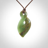 Hand carved New Zealand flower jade, twist pendant.