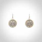 Hand carved round bone koru earrings with double sided engraving.