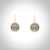 Hand carved round bone koru earrings with double sided engraving.