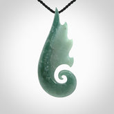 Hand carved large Guatemalan Jade shell koru drop pendant.