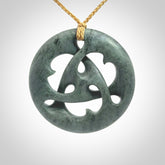 Hand carved New Zealand Nelson blue jade, complex twist drop pendant. Hand made complex twist pendant hand carved in New Zealand.