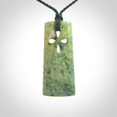 Hand carved New Zealand jade, complex twist pendant. Hand made complex twist pendant hand carved in New Zealand.