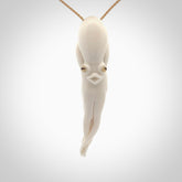 Hand carved octopus pendant in resting pose. This piece has been carved in incredible detail from bone. The artist is Fumio Noguchi, a renowned New Zealand bone carver who carves pieces for NZ Pacific. These unique bone pendants are for sale online at nzpacific.com One only collectors item for lovers of the ocean and octopus.