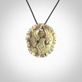 Hand carved Raiden Pendant. Made from Red Deer antler in New Zealand. Unique Japanese necklace hand made from deer antler by master bone carver Fumio Noguchi. Spectacular collectable work of art, made to wear. One only pendant, delivered to you at no extra cost with express courier.