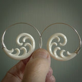 Hand carved earrings made from bone with sterling silver. NZ Pacific earrings for sale online.