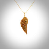 This is a hand carved lotus flower pendant. It is made from woolly mammoth tusk. This is a medium sized necklace and is a very unique, one only, pendant that is a collectors piece. Hand carved by New Zealand artist, Sami.