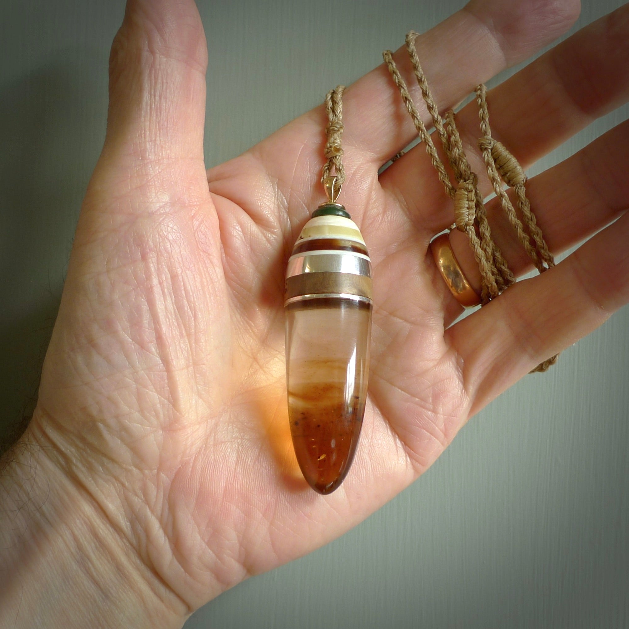 HAND CARVED AMBER CONTEMPORARY PENDANT. REAL AMBER DROP NECKLACE. NZ Pacific