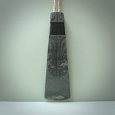 Hand carved large New Zealand Argillite Stone Wall hanging toki. Hand made wall hanging toki displayed in New Zealand Pākohe stone. Hand carved here in New Zealand by Kerry Thompson. This is a 'one only' sculpture, a beautiful display piece.