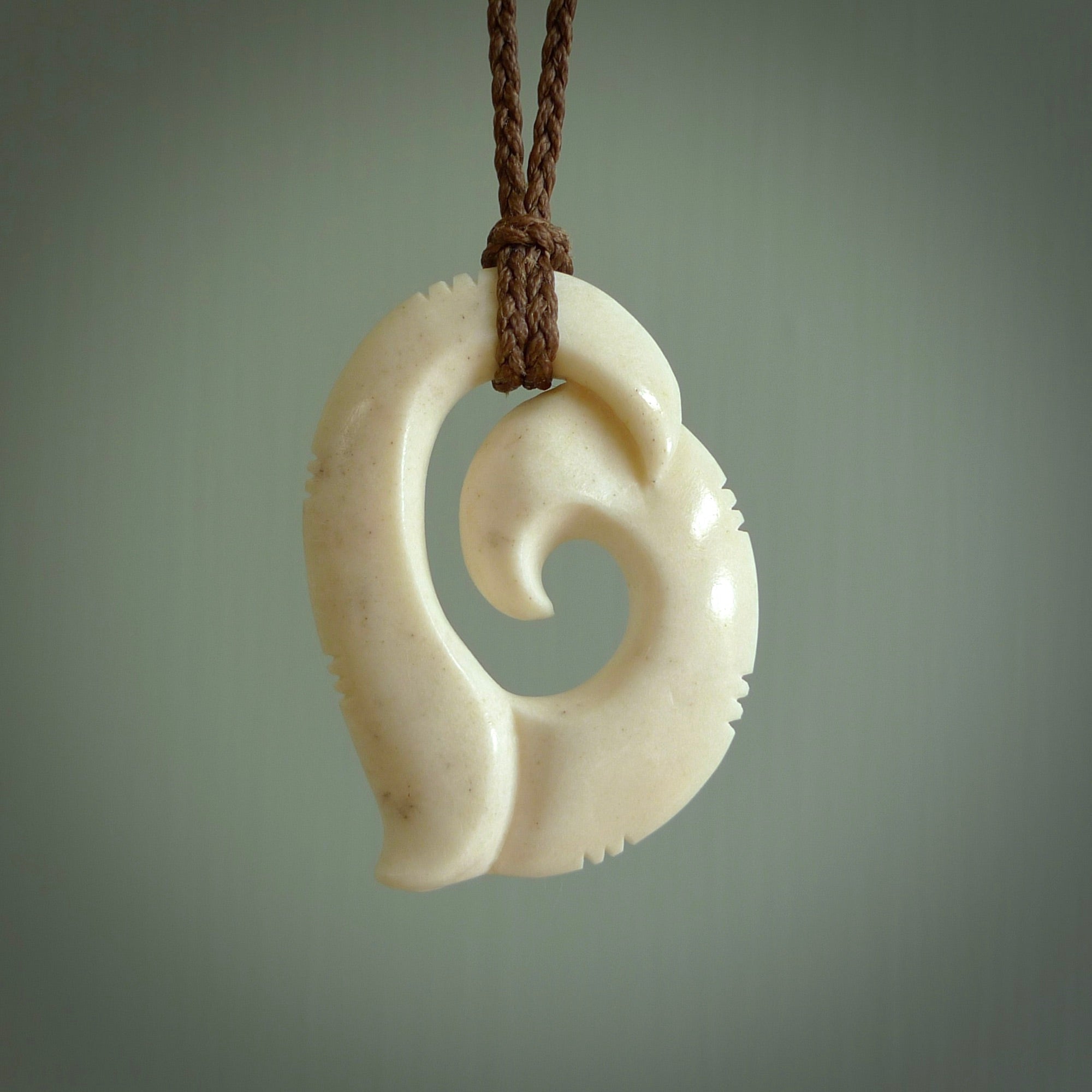 This is a wonderful, etched koru from Deer Antler. Hand carved by Anthony Bray-Heta. Order yours now on NZ Pacific at www.nzpacific.com