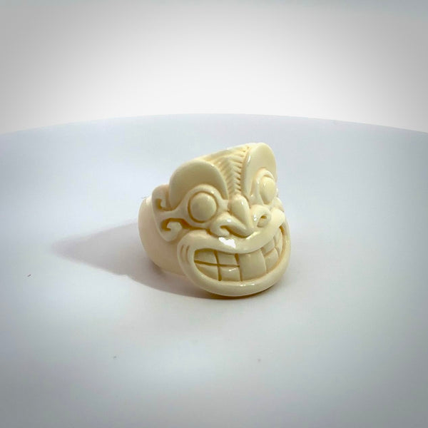 Hand carved natural bone tribal face ring. Natural bone ring with face design. Hand made ring, delivered with international airmail. Postage is included. One only bone ring.