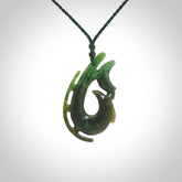 Hand carved Jade Hook with whale pendant. Hand carved by NZ Pacific, jade jewellery for sale online.