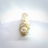 A contemporary hand carved flute. This piece is made from bone and is a fully functioning musical instrument and can be played. Beautiful art hand made by Yuri Terenyi. Flute with Dragons head.