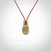 Hand carved boxing glove made from deer antler. The cord is adjustable so that you can wear this where it suits you best.