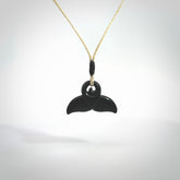 Hand carved Australian Black Jade whale tail pendant. Small whale tail necklace with adjustable cord.