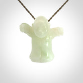 Jadeite monk pendant with adjustable necklace cord. Hand carved by NZ Pacific. Handmade jewellery for sale online. The cord is a hand plaited khaki green colour, which is length adjustable. Peaceful man necklace for men and women. Contemporary necklace hand made from Jadeite.