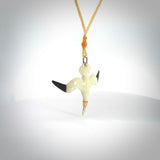 Hand carved stellar intricate Gannet bird carving pendant. A stunning work of art. This Gannet bird pendant was hand carved in Bone. A one off collectors item that has been hand crafted to be worn or displayed.