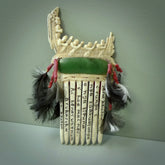 A photo of a New Zealand Jade Traditional Maori Heru, comb. This is a one off, statement piece - hand crafted here in New Zealand by Jeremy. Unique Art to Wear. Gifts for all lovers of hand made Art to Wear. One only collectors pendant. Delivery is free worldwide.