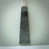 Hand carved large New Zealand Argillite Stone Wall hanging toki. Hand made wall hanging toki displayed in New Zealand Pākohe stone. Hand carved here in New Zealand by Kerry Thompson. This is a 'one only' sculpture, a beautiful display piece.