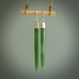 These are stunning large wing shaped drop jade earrings carved in New Zealand by Josey Coyle. It is carved from a deep green piece of New Zealand Jade and with Sterling Silver hooks and findings.
