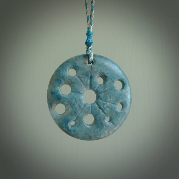 This is a handcrafted aotea stone disc pendant. This is a solid contemporary work of art. We ship this worldwide express courier and are happy to answer any questions that you may have about these or other products on our website. Hand made by Ana Krakosky.