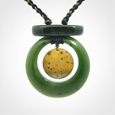 Hand carved New Zealand Jade peace bell pendant with adjustable cord. Free shipping worldwide.