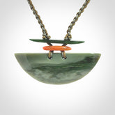 Hand carved New Zealand Jade half shield pendant with adjustable cord. Free shipping worldwide.
