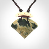 Hand carved New Zealand Jade drop pendant with adjustable cord. Free shipping worldwide.