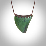 This pendant is a sized niho with koru heart necklace carved from a deep green piece of New Zealand Jade. Kyohei Noguchi carved this piece for us so the workmanship is outstanding. Handmade in New Zealand, a beautiful piece of jade jewellery.