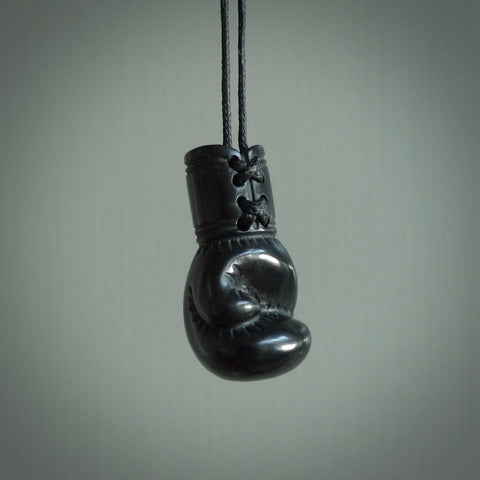 Hand carved boxing glove made from black jade. The cord is adjustable so that you can wear this where it suits you best. We ship these worldwide and the postage is included in the price. 