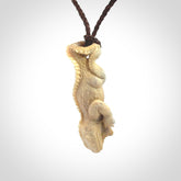 Hand carved deer antler Tuatara pendant.