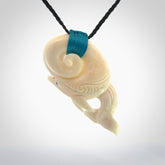 Hand carved natural dolphin bone pendant. Hand made bone dolphin necklace, delivered with Express Courier. Hand crafted bone dolphin koru pendant. One only necklace.