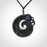 New Zealand Koru Manaia. Hand carved koropepe pendant. Made in New Zealand. Real Jade, pounamu.