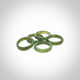 This is a hand carved jade ring. These are lovely British Columbian jade rings which are nice, solid little works of art. We ship these worldwide for free and are happy to answer any questions that you may have about these or other products on our website.