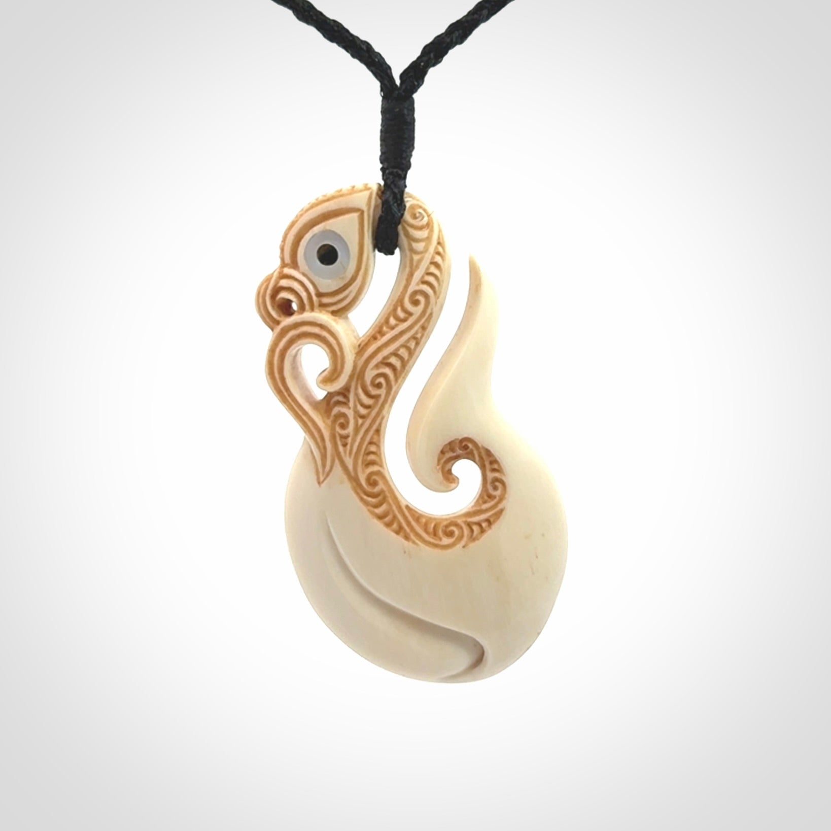 Hand carved bone manaia pendant