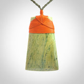 This is a lovely large toki pendant we've made from a gorgeous New Zealand Flower Jade. It is finished in a soft polish and is bound with our hand plaited, adjustable cord.