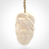 Hand carved bone woman dragon pendant