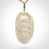 Hand Carved in Bone Dragon Woman Pendant