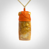 This is a beautiful hand carved Agate toki pendant. Provided with an adjustable cord and packaged in a woven kete pouch.