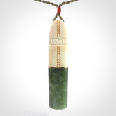 This is a wonderful New Zealand Jade and Bone drop pendant with brass inlay.