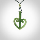 This is a beautiful koru pendant designed with a little inspiration from our national airline, Air New Zealand. Hand carved Jade koru pendant.