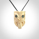 Hand carved Wheku pendant. Carved from woolly mammoth Tusk by NZ Pacific. Hand crafted Mammoth tusk jewellery for sale online. Provided with an adjustable cord and packaged in woven kete pouch.