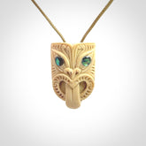 Hand carved Wheku pendant. Carved from woolly mammoth Tusk by NZ Pacific. Hand crafted Mammoth tusk jewellery for sale online. Provided with an adjustable cord and packaged in woven kete pouch.