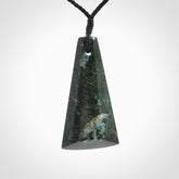 This is a handcrafted aotea stone drop pendant. Delivered with an adjustable hand plaited cord.