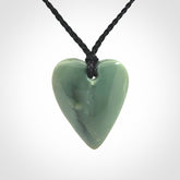A hand carved small heart pendant made from New Zealand Inanga jade.