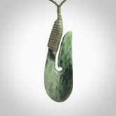 Hand carved jade matau pendant