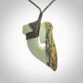 Hand carved jade matau, hook, pendant. Hand made in New Zealand from beautiful and striking Jade.