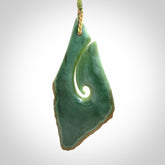Hand carved New Zealand jade hook, matau pendant.