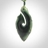 Hand carved New Zealand jade hook, matau pendant.