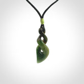 A sublime twist pendant carved in gorgeous jade